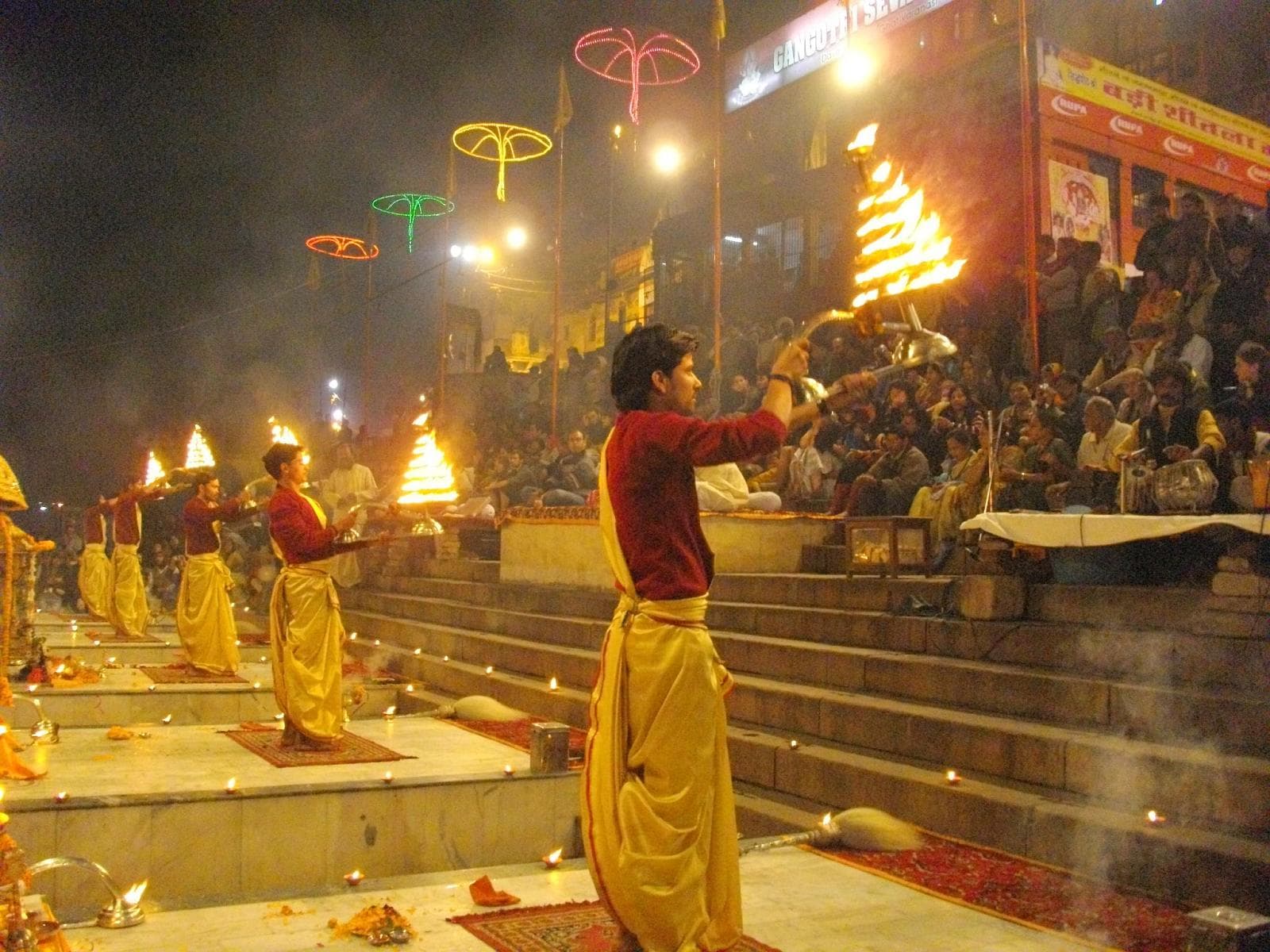 Ganga Aarti lamps raised on the ghats of Kashi