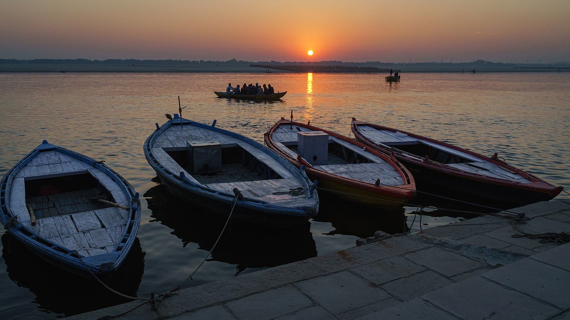 Wooden boats on the Ganga at golden hour